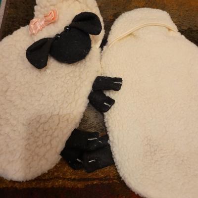 Assortment of towels, two hot water bags, shower curtain, hair clips