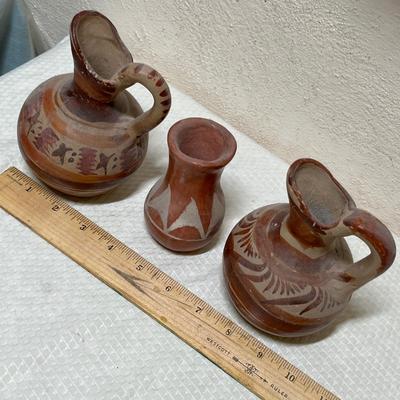 Lot 427 Three tribal pottery pieces