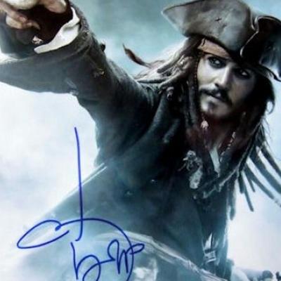 Johnny Depp signed Pirates of the Caribbean movie photo 