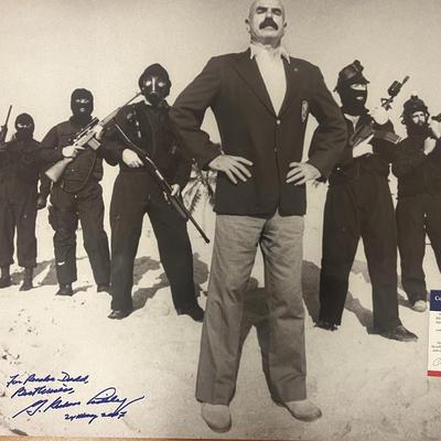 G. Gordon Liddy signed photo. PSA