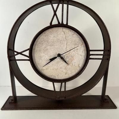 Lot 180. Metal Clock