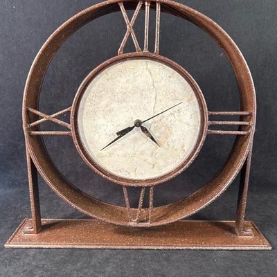 Lot 180. Metal Clock