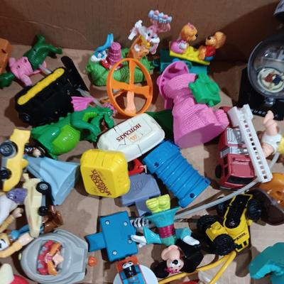 A LARGE COLLECTION OF EARLIER HAPPY MEAL TOYS (4)