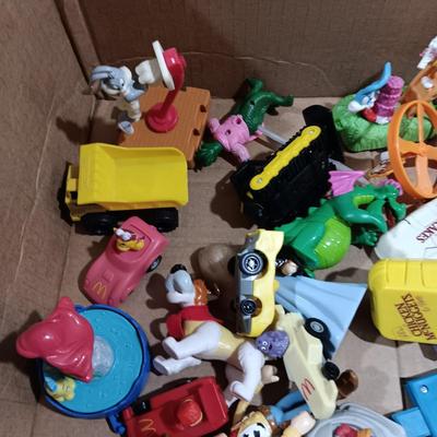 A LARGE COLLECTION OF EARLIER HAPPY MEAL TOYS (4)