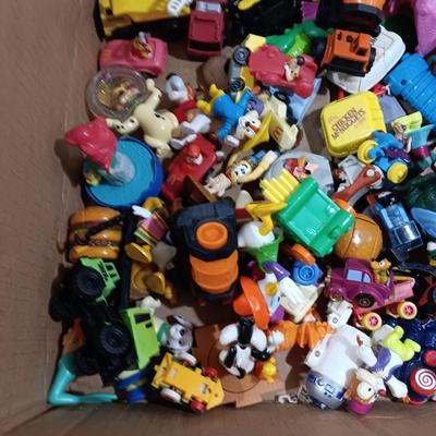 A LARGE COLLECTION OF EARLIER HAPPY MEAL TOYS (4)