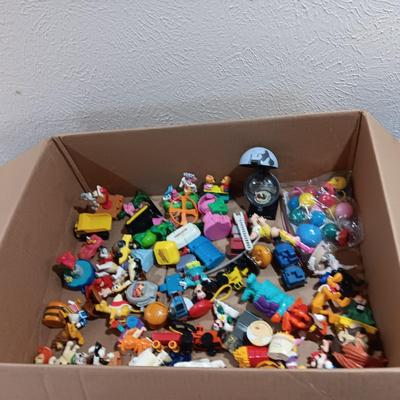 A LARGE COLLECTION OF EARLIER HAPPY MEAL TOYS (4)