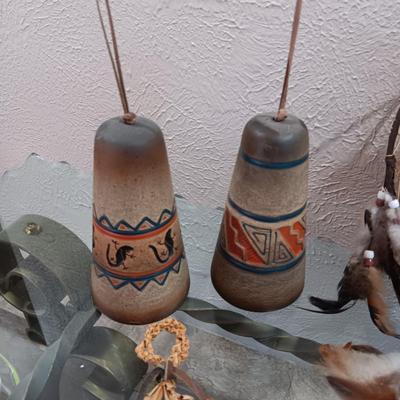 4 CLAY BELLS, PORCELAIN DOLL IN A SWING LIKE AND 2 STRAW & WHEAT ART PIECES