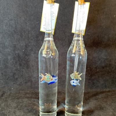Lot 127. Decorative bottles with glass fish