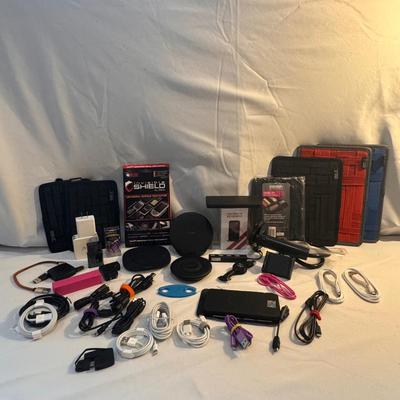 Several Wireless Chargers, Charger Chords, and Other Tech Accessories (K-DZ)