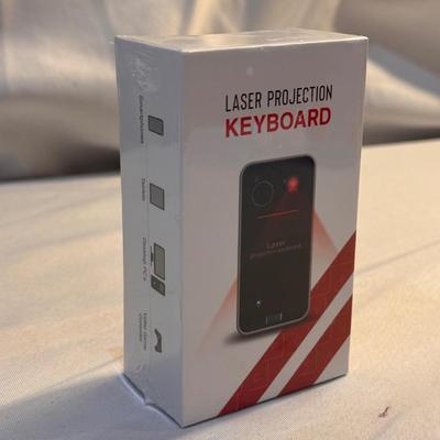 Several Wireless Chargers, Charger Chords, and Other Tech Accessories (K-DZ)