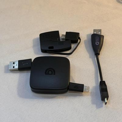 Several Wireless Chargers, Charger Chords, and Other Tech Accessories (K-DZ)