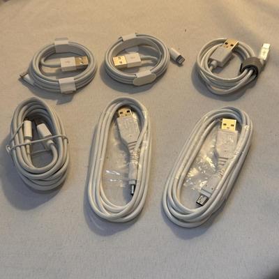 Several Wireless Chargers, Charger Chords, and Other Tech Accessories (K-DZ)