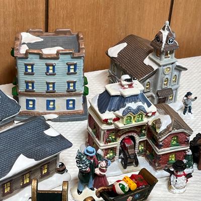 Lot 730 Christmas village pieces