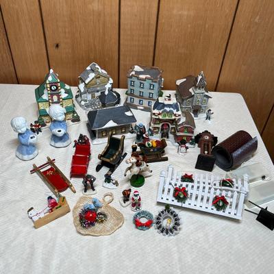 Lot 730 Christmas village pieces