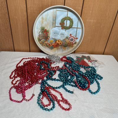 Lot 746 Tin of mercury glass garland