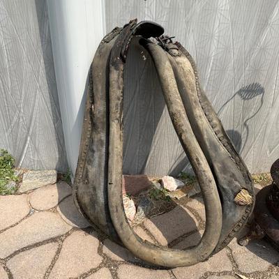 2 LEATHER HORSE COLLARS AND A WOOD STOVE
