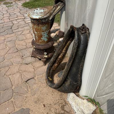 2 LEATHER HORSE COLLARS AND A WOOD STOVE