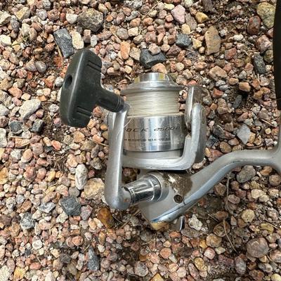 4 FISHING POLES WITH REELS