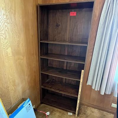 Lot 815 Particle board book shelf
