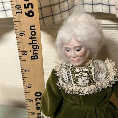 Lot 830 Old ladies dolls