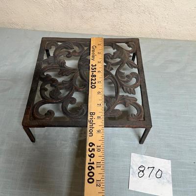 Lot 870 Cast iron trivets