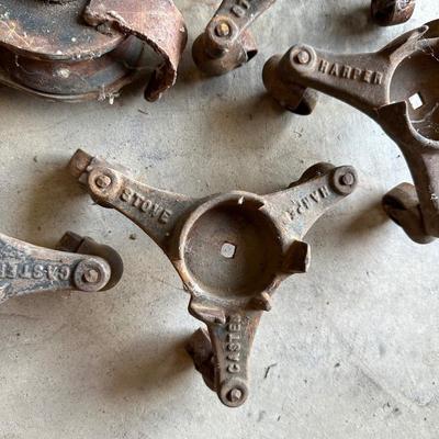 IRON PULLEY AND ANTIQUE 3 WHEEL CASTERS
