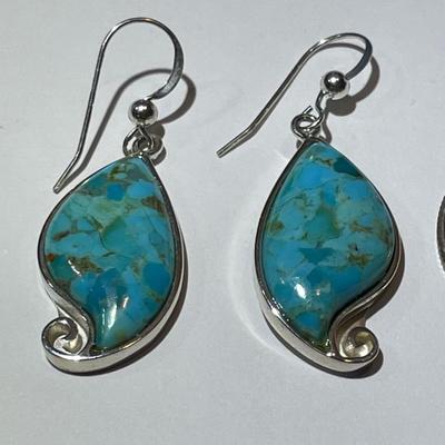 Sterling Silver Turquoise Dangling Earrings in New Never Worn Condition as Pictured.