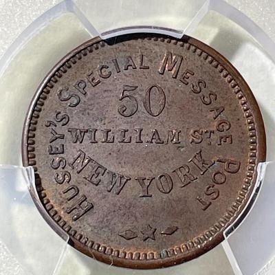 PCGS Certified Scarce 1863 Token F-630AK-1a, Hussey's NY Token, MS62 Brown Nice Original Example as Pictured.