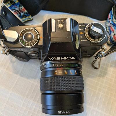 Nice Classic Yashica FX-103 Camera and Accessories