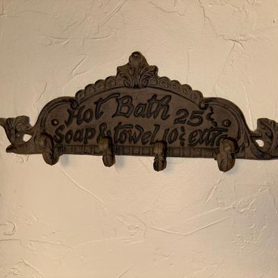 2 CAST IRON "HAIRCUT" AND "HOT BATH" WALL DECOR WITH CLIPS