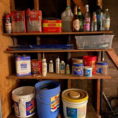 Vintage cans, bottle, and buckets