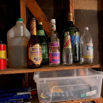 Vintage cans, bottle, and buckets
