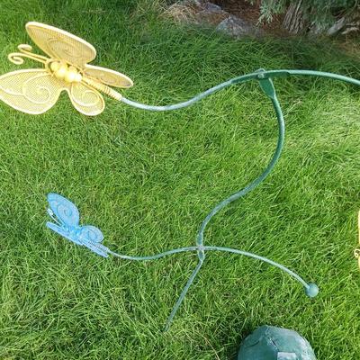 2 STAKED COUNTER WEIGHTED BUTTERFLIES AND A CEMENT FROG