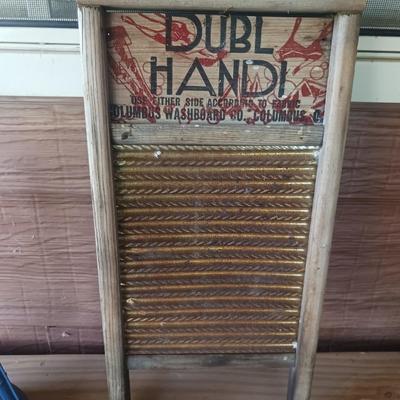 2 MAN SAW, DUBL HANDI WASHBOARD AND AN OLD LANTERN