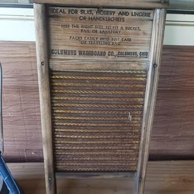 2 MAN SAW, DUBL HANDI WASHBOARD AND AN OLD LANTERN