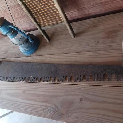 2 MAN SAW, DUBL HANDI WASHBOARD AND AN OLD LANTERN