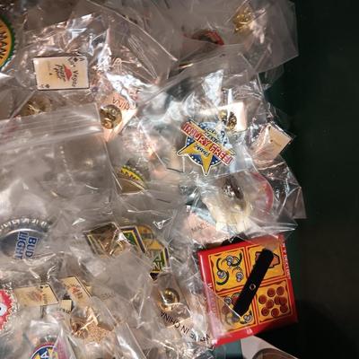 MANY NEW SAFETY PINS MAINLY FROM PIZZA HUT