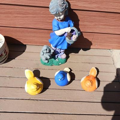GARDEN CONCRETE BIRDS AND A LITTLE GIRL