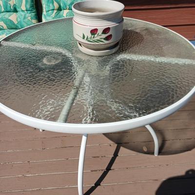 GLASS TOP PATIO TABLE AND A FLOWER POT