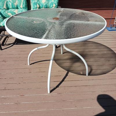 GLASS TOP PATIO TABLE AND A FLOWER POT