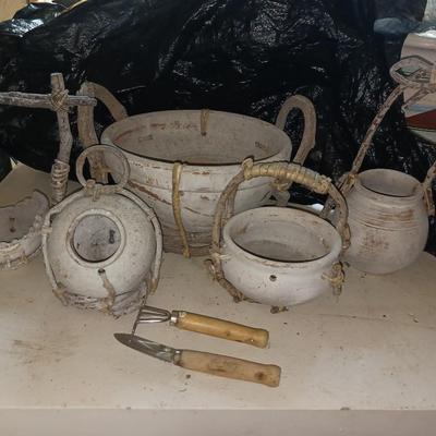 CLAY POTS WITH TWIG HANDLES AND ACCENTS