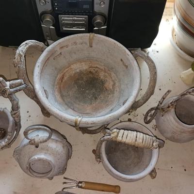 CLAY POTS WITH TWIG HANDLES AND ACCENTS