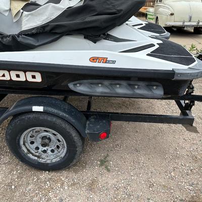 TWO 2013 SEA-DOO JET SKIS WITH TRAILER
