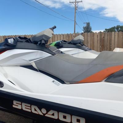 TWO 2013 SEA-DOO JET SKIS WITH TRAILER
