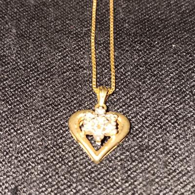 TWO 14K CHAINS AND TWO 10K PENDANTS