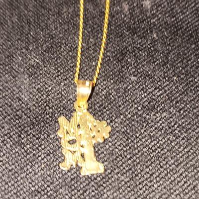 TWO 14K CHAINS AND TWO 10K PENDANTS