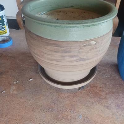 4 CLAY FLOWER POTS