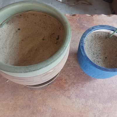 4 CLAY FLOWER POTS