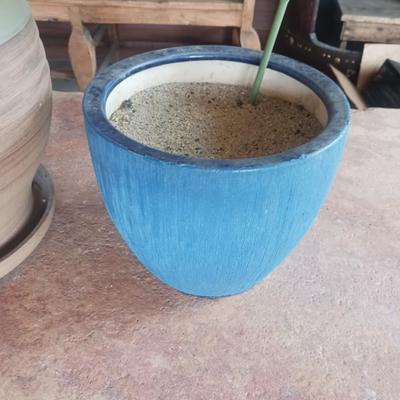 4 CLAY FLOWER POTS