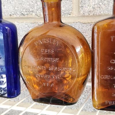 Collection Colored Bottles Herbs Spices